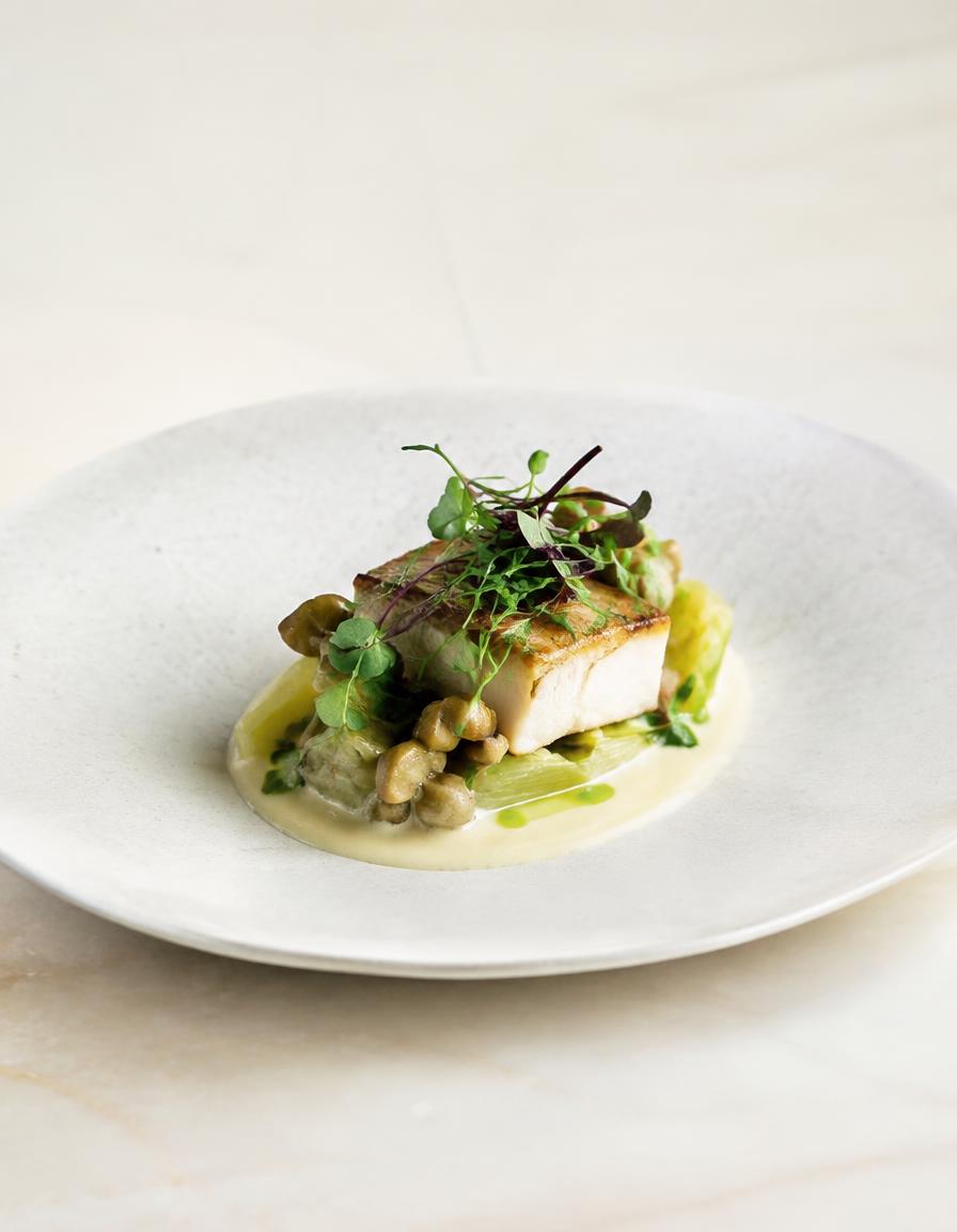 Gourmet plated fish with microgreens